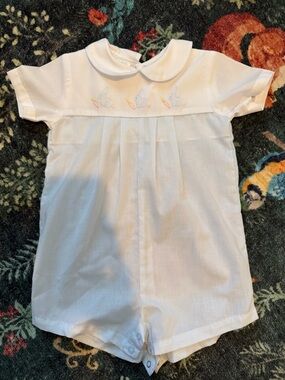 Petit Ami White Infant Romper with Blue Logo Tag